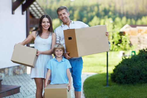 Prepared family house move with boxes and furniture organised