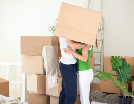 Local moving team loading furniture into a van in Harrow Weald