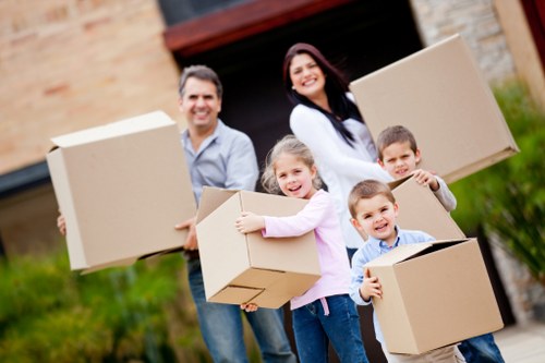 Professional movers loading furniture for a local relocation in Harrow Weald