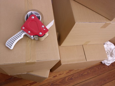 Packed boxes and furniture ready for transport in a local move