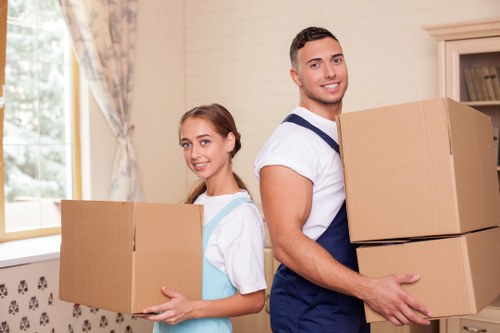 Charity donation boxes and furniture reuse during a local removal